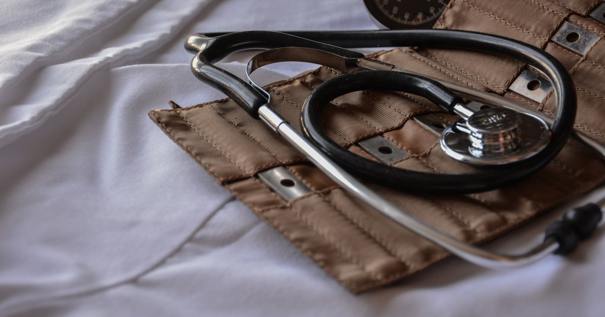Black stethoscope with leather case